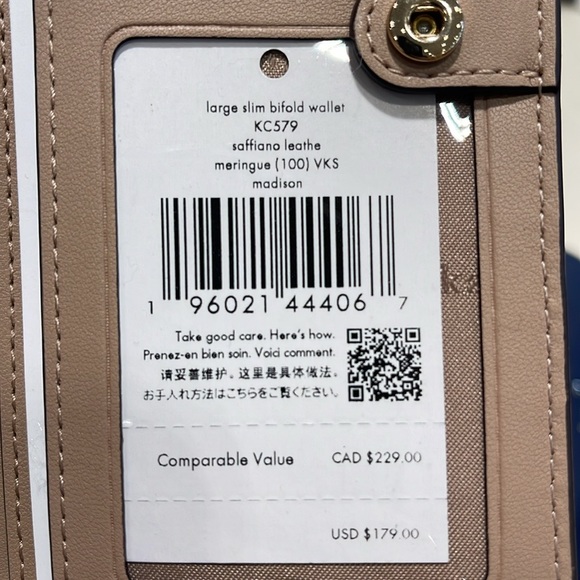 Kate Spade Madison Large Slim Bifold Wallet
Meringue 
NWT - Picture 4 of 16